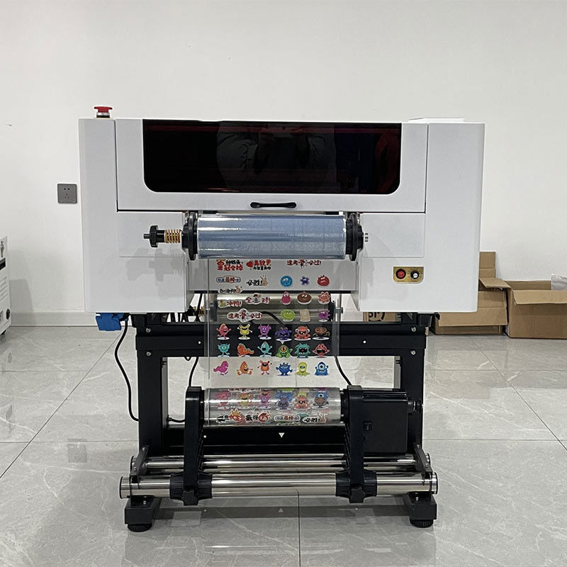 Impresora DTF UV A3 de 30 cm de película AB I3200 cabezas todo en un solo rollo para rodar Impresora DTF UV con máquina de impresión laminadora